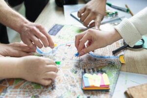 close up hands having small flags