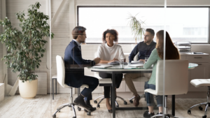 Marketing team meeting in a modern office.
